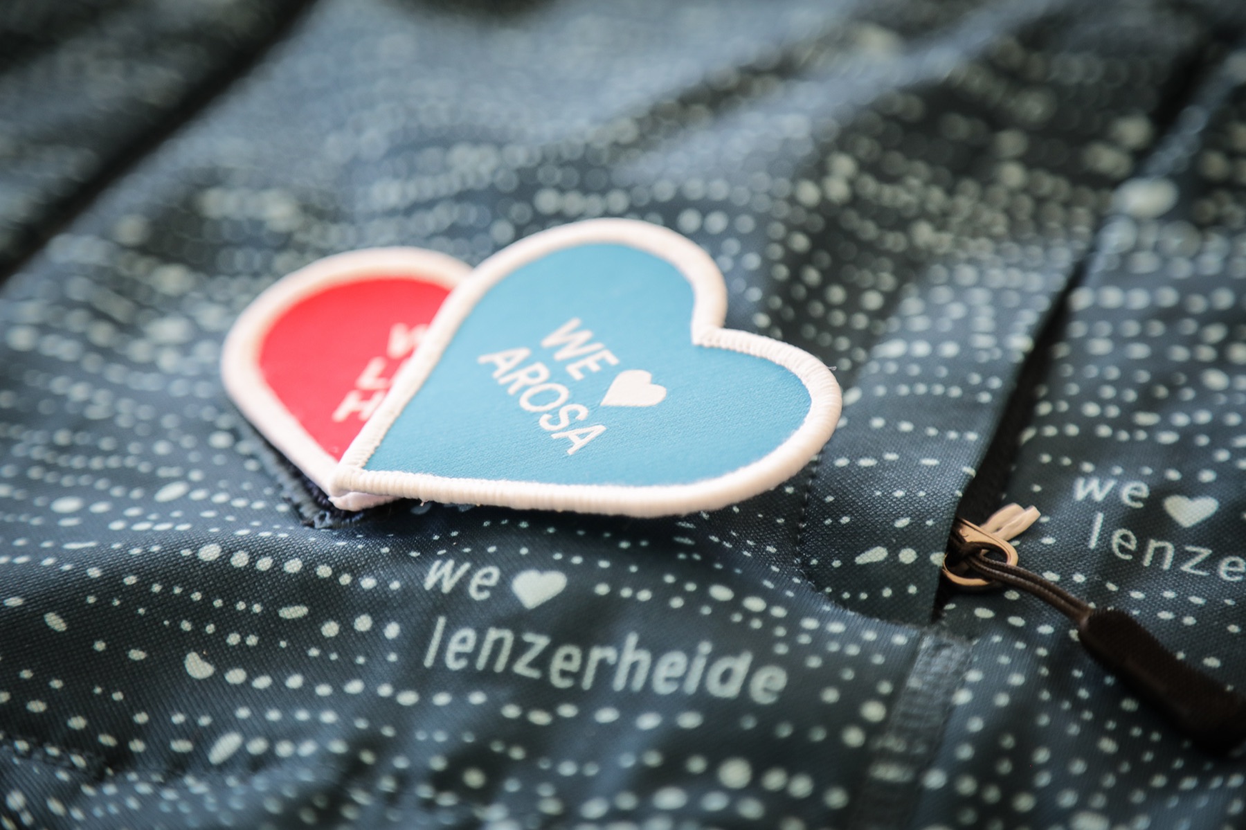 Herz-Patches mit We love Arosa und We love Lenzerheide